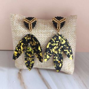 boucles d'oreilles Pénélope pendantes feuilles acrylique noires et dorées